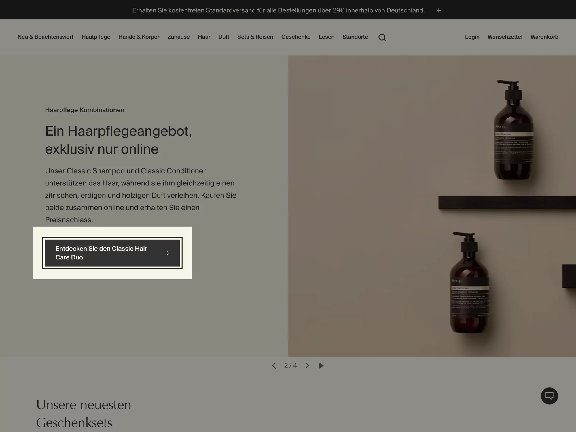 A screenshot of the Aesop website showing a simple black outline around a button with the text âEntdecken Sie den Classic Hair Care Duoâ
