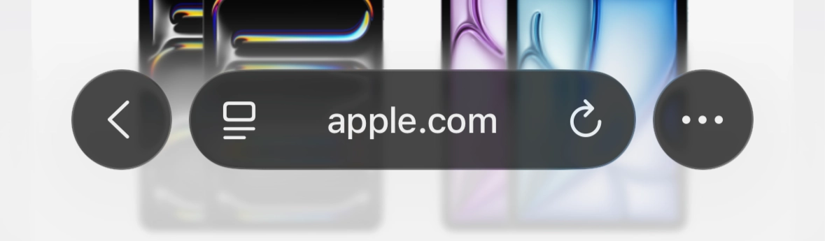 Screenshot of iOS 26.1 Safari with "Tinted" Liquid Glass, showing apple.com. The text and icons in the address bar are perfectly readable.